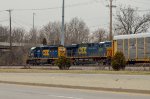 CSX SD40-2 and ES40DC leading a train